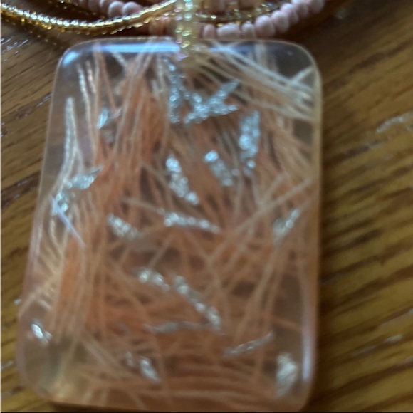Necklace cute four bead strands 21” with plastic 2” pendant in soft peach color. - Picture 6 of 7